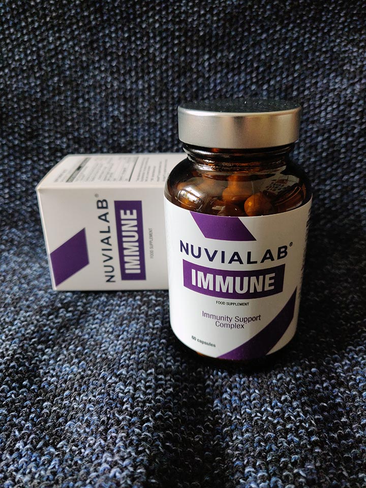 NuviaLab Immune supplement bottle showing quercetin, vitamin C, and nucleotides for comprehensive immunity